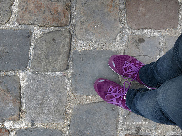 My sore feet on the cobblestone path that leads to Versailles.